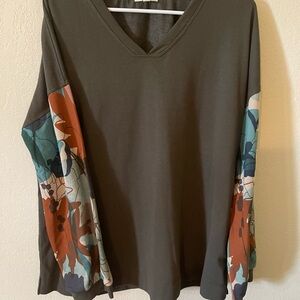 Elegant V-Neck Blouse with Floral Sleeves